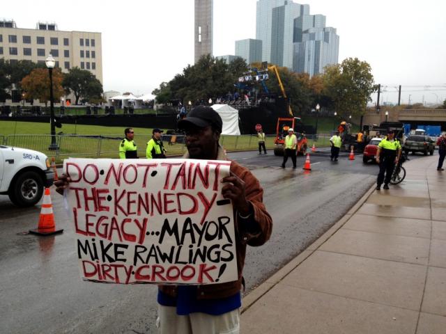  Benny Jeffery protests Dallas mayor Mike Rawlings' decision to pave over the “X” which marks the spot of President Kennedy's death.