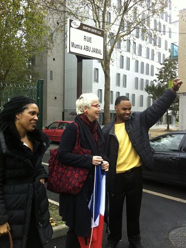 One of Abu-Jamal's sons - Jamal - (right) at street naming ceremony in a suburb of Paris. -LBWPhoto