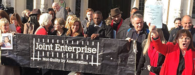 Deb Madden (far right) holds ruling outside British Supreme Court building. LBW Photo