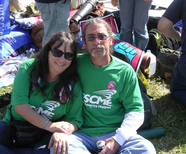 Chris and Jerry McDonough, union activists from Madison, WI, came to occupy Washington (photo by Lindorff)