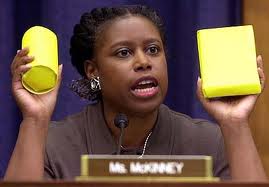 Former Congresswoman Cynthia McKinney on Libyan state TV displaying anti-personnel weapons dropped by NATO forces..