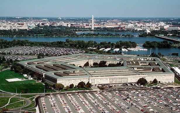 The Pentagon, world's largest office building, surrounded by parking lots for the warmakers