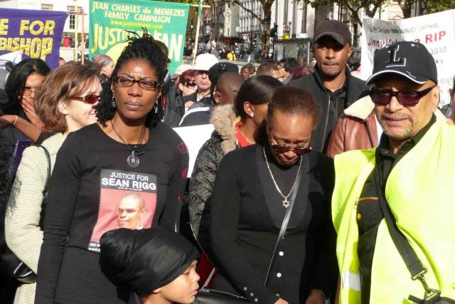 March participants Rigg and Bennett whose brothers died in police custody, at protest march (photo by Washington)