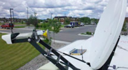 A typical satellite dish mounted on a Puerto Rican business site's roof providing cell phone and internet capability, but not fo